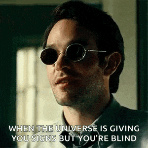 a man wearing sunglasses is giving a speech .