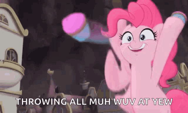 pinkie pie from my little pony is throwing a ball in the air while standing in front of a building .
