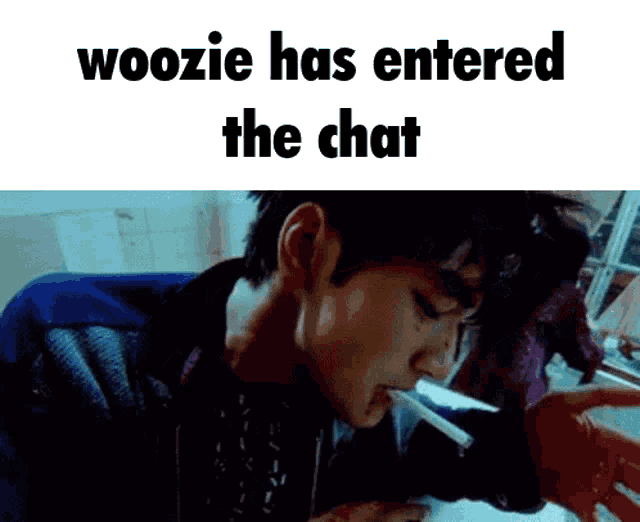 a picture of a man smoking a cigarette with the words woozie has entered the chat below him