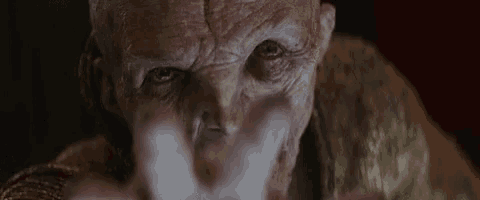 a close up of a person 's face with a very wrinkled face and a very old looking face .