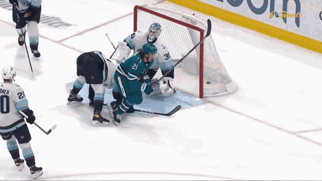 a hockey game is being played and the goalie is number 31