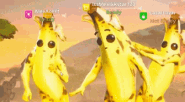three bananas are standing next to each other on a video game screen .