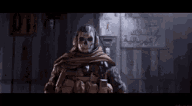 a skeleton wearing headphones and a cape is standing in front of a wall with arabic writing on it .