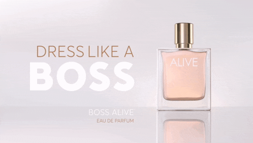a bottle of boss alive eau de parfum is on a table