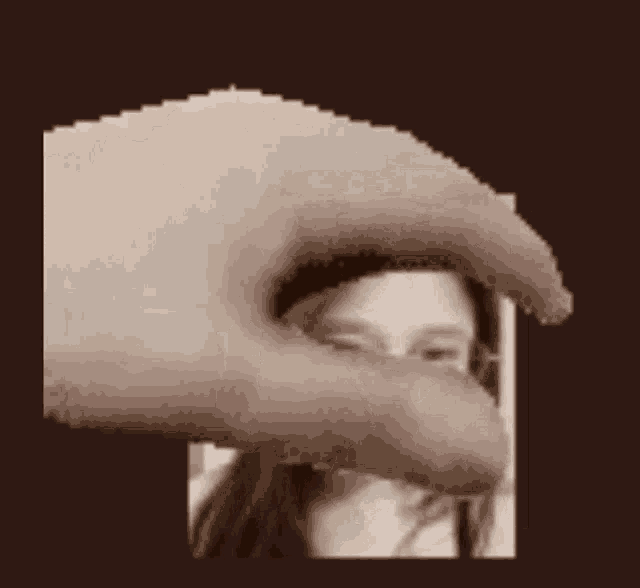 a pixel art of a person holding a picture of a woman .