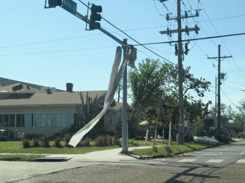 a street sign on a pole that says amity st
