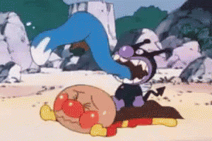 an anpanman cartoon character is laying on the ground with a blue monster coming out of his mouth