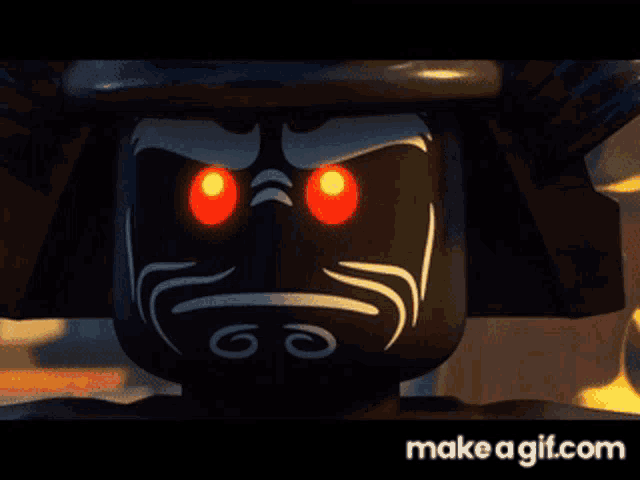 a black lego figure with red eyes and a beard