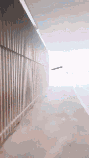 a blurred image of a tunnel with a light at the end of it