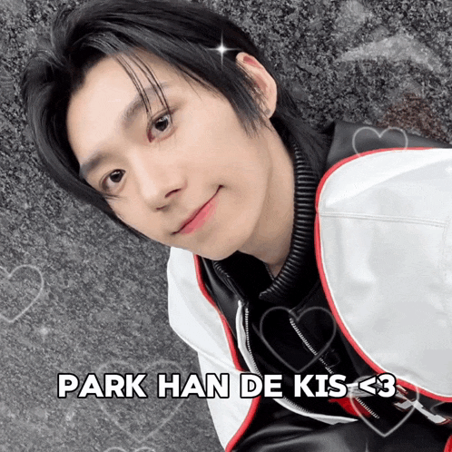 a picture of a young man with the caption park han de kiss < 3