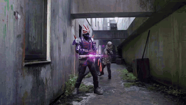 a man in a purple costume holding a purple gun