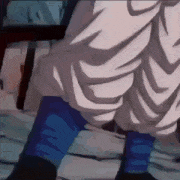 a close up of a person 's pants with blue socks