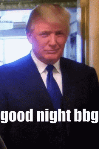 a man in a suit and tie says good night