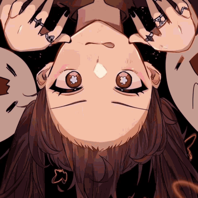 a drawing of a girl with rings on her fingers looks upside down