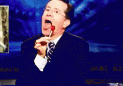 Colbert Lollipop GIF - Stephen Colbert Lollipop Licking GIFs