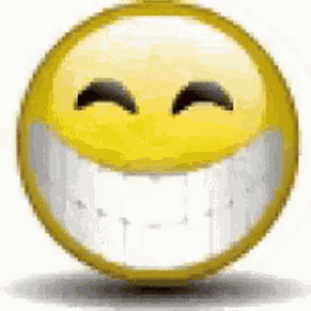 a close up of a smiley face with a big smile and white teeth .