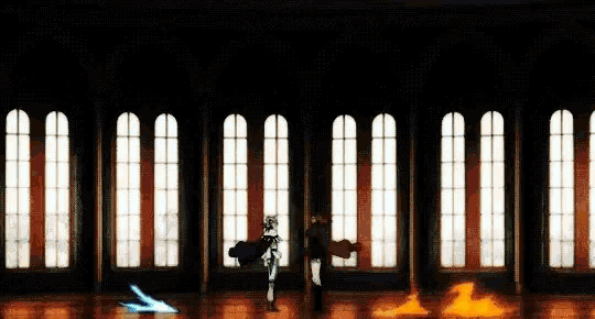 a man is standing in a room with a lot of windows and a fire coming out of the window .