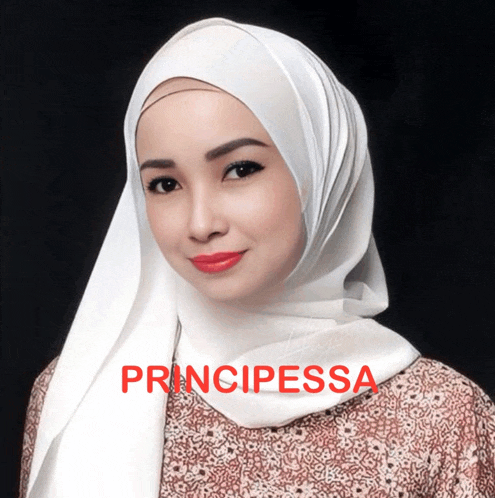 a woman wearing a white hijab with the word principessa written on the bottom