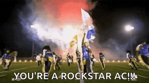a group of people on a field with the words " you 're a rockstar ac " on the bottom