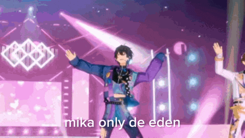 a man in a purple suit is dancing on a stage with his arms in the air .