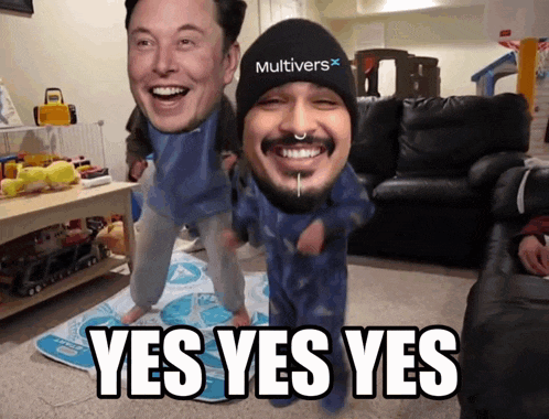 a man wearing a hat that says multiverse is standing next to a baby