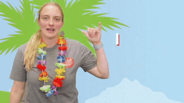 a woman wearing a lei and a t-shirt that says i 'm on i sl