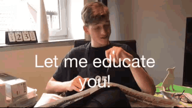 a young man is sitting at a table reading a newspaper and the words let me educate you are behind him
