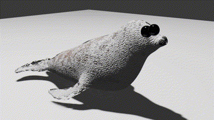 a stuffed seal with sunglasses on its eyes is sitting on a white surface