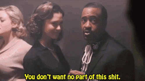 a man and a woman are standing next to each other and the man says you don 't want no part of this shit