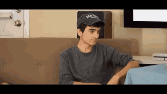a man wearing a hat that says san diego on it