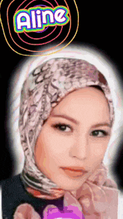 a woman in a hijab with the name aline above her