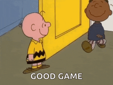 charlie brown is hugging a black boy in a cartoon .
