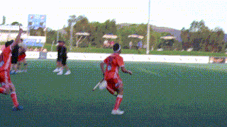 a soccer player wearing a red jersey with the number 8 on it