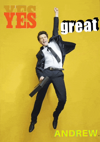 a man in a suit and tie is jumping in the air with the words yes great andrew