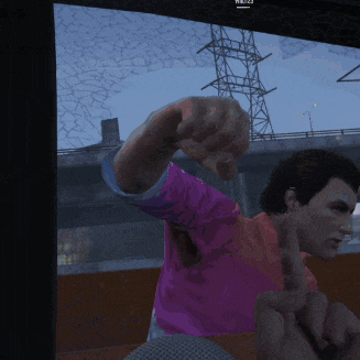 a man in a pink shirt is pointing his finger