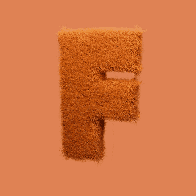 a furry letter f is against an orange backdrop