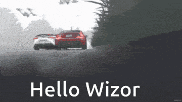 a picture of two cars driving down a road with the words hello wzor below them