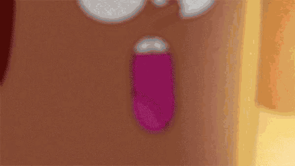 a close up of a pink tongue sticking out of a person 's mouth