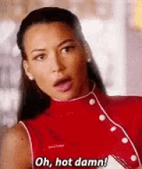 a woman in a red dress is talking and says `` oh , hot damn ! ''