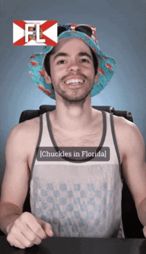 a man wearing a hat and sunglasses says chuckles in florida on his shirt