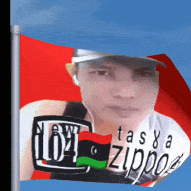 a man 's face is on a red flag that says tasya zippo