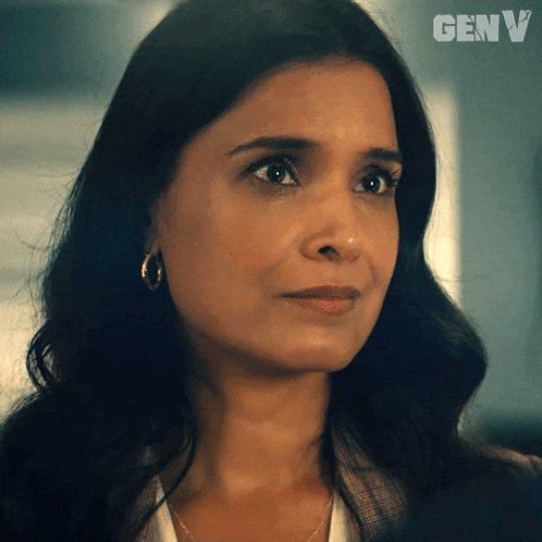 a close up of a woman 's face with the word genv on the bottom right