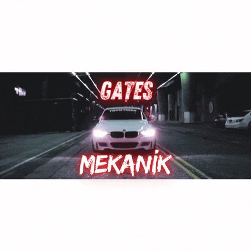a white bmw is driving down a street with gates mekanik written on the side