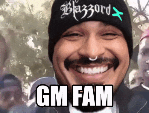 a man wearing a black beanie that says blazord on it