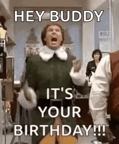 a man in a green elf costume is screaming and holding a guitar in a room .