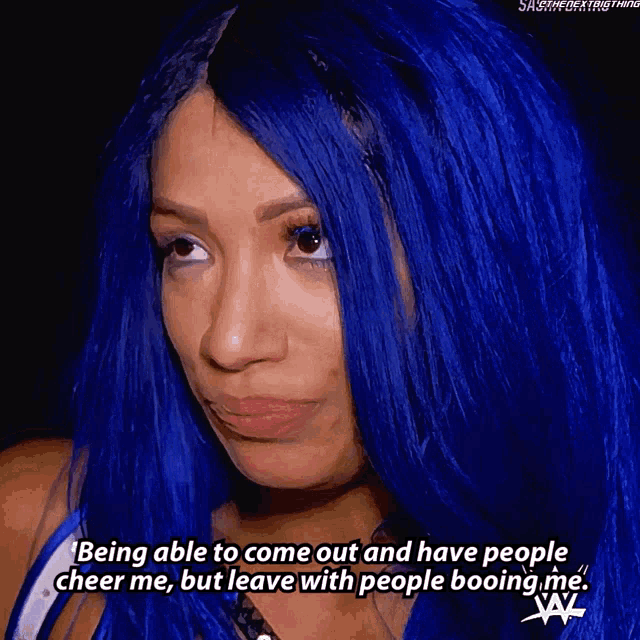 a woman with blue hair is talking about being able to come out and have people cheer her but leave with people booing her