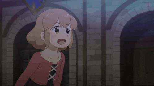 a girl in a red top with a lace up neckline