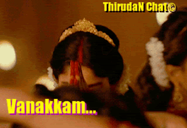 a blurred image of a woman with the words vanakkam on the bottom