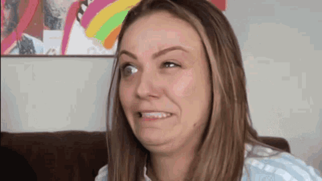 a woman making a funny face with her mouth open
