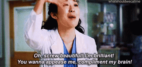 a woman in a white lab coat is crying and saying oh screw beautiful i 'm brilliant